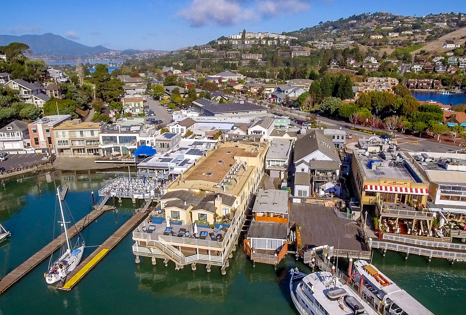 Waters Edge Hotel in Tiburon California is perched on the shore of San Francisco Bay with a bayside deck for beautiful views