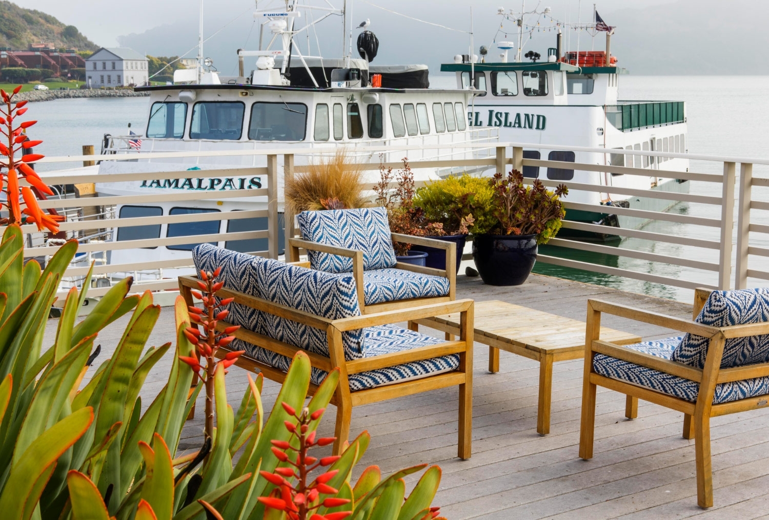 Ferries docked adjacent to Waters Edge Hotel Waterfront Grand Deck with comfortable patio furniture and plants5-3135.jpg